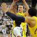 Michigan freshman Nik Stauskas shoots over Michigan State defense during the second half at Breslin Center in East Lansing on Tuesday, Feb. 12. Melanie Maxwell I AnnArbor.com